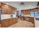 Bright, spacious kitchen featuring custom cabinets, stainless steel appliances, and ample counter space at 2704 Miraflores Ave, Las Vegas, NV 89102
