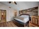 Bedroom featuring wood floors, ceiling fan, and sliding closet doors at 2704 Miraflores Ave, Las Vegas, NV 89102
