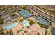 Gorgeous aerial view of resort-style amenities: swimming pools and tennis courts for recreation and relaxation at 28 Verde Rosa Dr, Henderson, NV 89011