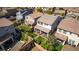 A backyard features a well-manicured lawn, patio area and lush landscaping, creating an inviting outdoor living space at 28 Verde Rosa Dr, Henderson, NV 89011
