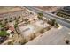 Aerial view of community basketball court and shaded seating area for residents to gather and play at 28 Verde Rosa Dr, Henderson, NV 89011