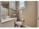 Stylish bathroom featuring modern fixtures, a decorative shelf, and neutral wall paint at 28 Verde Rosa Dr, Henderson, NV 89011