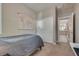 Comfortable bedroom with a world map, closet and neutral decor, offering a serene retreat at 28 Verde Rosa Dr, Henderson, NV 89011
