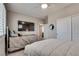 Bedroom with two beds, a ceiling fan and an attached tv at 28 Verde Rosa Dr, Henderson, NV 89011