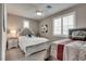 Bedroom featuring two beds, soft lighting, and a ceiling fan at 28 Verde Rosa Dr, Henderson, NV 89011