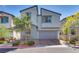 Charming two-story home with neat landscaping and a two-car garage, perfect for suburban living at 28 Verde Rosa Dr, Henderson, NV 89011