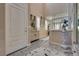 Inviting foyer with modern flooring, stylish decor, and an open staircase, creating a welcoming entrance at 28 Verde Rosa Dr, Henderson, NV 89011