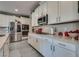 Contemporary kitchen featuring stainless steel appliances and a gas range, with sleek countertops at 28 Verde Rosa Dr, Henderson, NV 89011