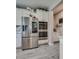 A modern kitchen showcasing stainless steel appliances and white cabinetry at 28 Verde Rosa Dr, Henderson, NV 89011