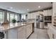 Spacious kitchen with stainless steel appliances, granite countertops, and modern recessed lighting at 28 Verde Rosa Dr, Henderson, NV 89011