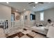 Upstairs living area with a sofa, television, and comfortable seating area at 28 Verde Rosa Dr, Henderson, NV 89011