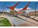 See the community playground featuring shade structures and unique play elements, designed for Gathering fun and outdoor enjoyment at 28 Verde Rosa Dr, Henderson, NV 89011