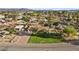 An elevated view showcases the house, landscaping, neighborhood and surrounding mountain view at 2885 Horseshoe Dr, Las Vegas, NV 89120