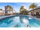 Inviting backyard with a refreshing pool, patio area, and verdant landscaping at 2885 Horseshoe Dr, Las Vegas, NV 89120
