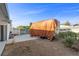 A large partially-covered trailer is parked in the large backyard of this home for sale at 2885 Horseshoe Dr, Las Vegas, NV 89120