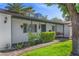 Charming single-story home featuring a well-maintained front yard and inviting entrance with a decorative swing at 2885 Horseshoe Dr, Las Vegas, NV 89120