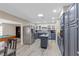 Spacious kitchen showcasing stainless steel appliances, granite countertops, an island, and open access to a rec room at 2885 Horseshoe Dr, Las Vegas, NV 89120