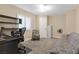 Versatile office space with neutral colors and ample room for a desk and seating at 2885 Horseshoe Dr, Las Vegas, NV 89120