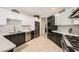 Stylish kitchen with stainless steel appliances, modern cabinetry, and tile flooring at 3111 Lido Isle Ct, Las Vegas, NV 89117