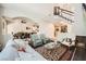 Spacious living room featuring high ceilings, plush seating, and open floor plan at 3111 Lido Isle Ct, Las Vegas, NV 89117