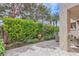 Outdoor patio showcasing the vibrant garden, lush greenery, and comfortable seating area at 3111 Lido Isle Ct, Las Vegas, NV 89117