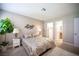 Comfortable bedroom with carpet, plant, decorative lighting, and a serene atmosphere at 3151 Soaring Gulls Dr # 1181, Las Vegas, NV 89128