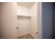A walk in closet featuring white walls, carpet, and a shelf with hanging rod at 3151 Soaring Gulls Dr # 1181, Las Vegas, NV 89128