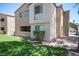 Condominium building with landscaped grounds and stairs to upper level units at 3151 Soaring Gulls Dr # 1181, Las Vegas, NV 89128