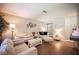 Cozy living room showcases hardwood floors, neutral paint, and a modern furniture set at 3151 Soaring Gulls Dr # 1181, Las Vegas, NV 89128