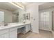 The bathroom features double sinks, a vanity area, and a glass block window at 3246 Brookfield Dr, Las Vegas, NV 89120