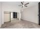 This bedroom includes mirrored closet doors and a dark stone fireplace at 3246 Brookfield Dr, Las Vegas, NV 89120