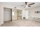 Bedroom with mirrored closet doors, ceiling fan, and neutral carpet at 3246 Brookfield Dr, Las Vegas, NV 89120