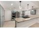 Beautiful kitchen featuring granite countertops, stainless steel appliances, and blue cabinets at 3246 Brookfield Dr, Las Vegas, NV 89120