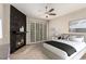 Stylish main bedroom features a modern fireplace, serene decor, and sliding glass doors with plantation shutters at 3246 Brookfield Dr, Las Vegas, NV 89120