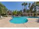 Relaxing pool area surrounded by lush landscaping and comfortable lounge chairs at 3246 Brookfield Dr, Las Vegas, NV 89120