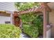 Charming home entrance with a brick facade and a decorative wreath on the door at 3249 Dayflower St # C, Las Vegas, NV 89121