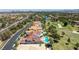 Stunning neighborhood aerial showcasing mature trees, golf course and tile-roofed homes at 35 Ventana Canyon Dr, Las Vegas, NV 89113