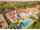 Impressive aerial view of a large home featuring a swimming pool, spa, manicured lawn, and inviting outdoor spaces at 35 Ventana Canyon Dr, Las Vegas, NV 89113