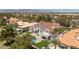 Beautiful aerial view of a grand home, lush landscaping, and a sparkling pool at 35 Ventana Canyon Dr, Las Vegas, NV 89113