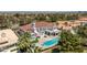 Impressive aerial view of a luxurious home with a pool, manicured grounds, and a tile roof at 35 Ventana Canyon Dr, Las Vegas, NV 89113