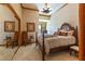 Ornate primary bedroom features a sitting area, coffered ceilings, and a decorative chandelier at 35 Ventana Canyon Dr, Las Vegas, NV 89113