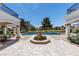 Stunning outdoor pool area with a central fountain and lush landscaping, perfect for relaxation at 35 Ventana Canyon Dr, Las Vegas, NV 89113
