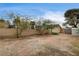 Large, fenced backyard with sheds and block wall offers a private outdoor space at 3575 W Robindale Rd, Las Vegas, NV 89139