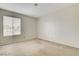 Neutral bedroom with a window providing natural light at 3575 W Robindale Rd, Las Vegas, NV 89139