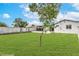 Spacious backyard with a well-maintained lawn and a small tree at 40 Laswell St, Henderson, NV 89015