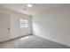 Bright bedroom featuring neutral carpeting and a window at 40 Laswell St, Henderson, NV 89015