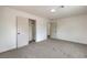 Bright bedroom featuring neutral carpeting and closet at 40 Laswell St, Henderson, NV 89015