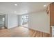 A bright living space with a sliding door and a view into other rooms at 40 Laswell St, Henderson, NV 89015