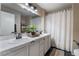 Bathroom featuring a double vanity and shower at 4209 Glass Lantern Dr, North Las Vegas, NV 89032