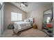 Bedroom with a neutral palette and a large mirror at 4209 Glass Lantern Dr, North Las Vegas, NV 89032